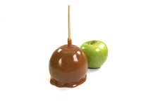 Load image into Gallery viewer, This is a plain caraeml apple with a Granny Smith apple in the background.